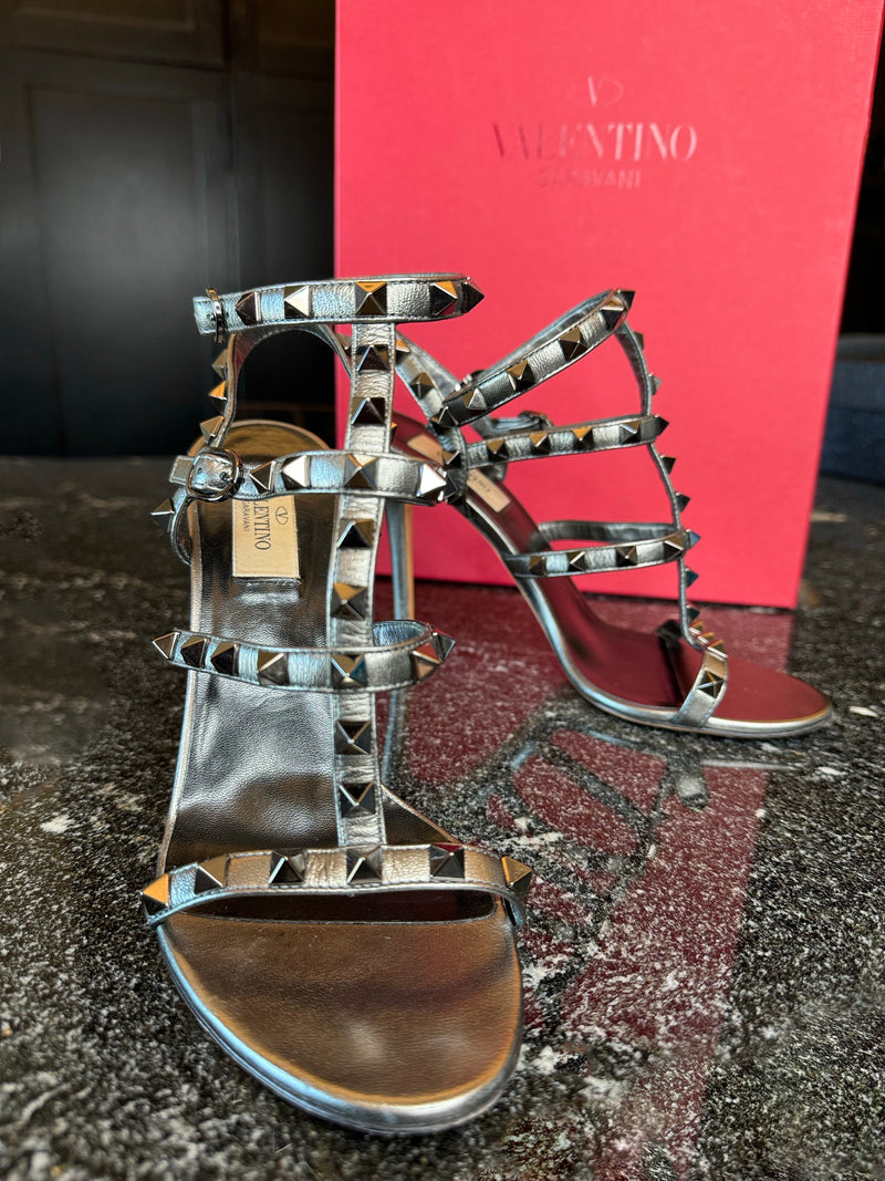 100% AUTHENTIC Grey (Silver Gunmetal) VALENTINO 105 MM Rockstud Caged High Heel Sandals size 36.5 (US 6.5)  Current Purchase Price: $1,150 Price in Zoe's Closet: $670 + free shipping + Afterpay and Shop Pay eligible at checkout