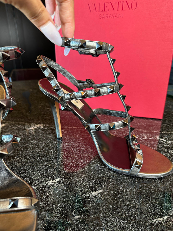 100% AUTHENTIC Grey (Silver Gunmetal) VALENTINO 105 MM Rockstud Caged High Heel Sandals size 36.5 (US 6.5)  Current Purchase Price: $1,150 Price in Zoe's Closet: $670 + free shipping + Afterpay and Shop Pay eligible at checkout