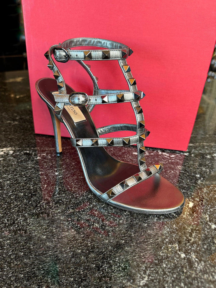 100% AUTHENTIC Grey (Silver Gunmetal) VALENTINO 105 MM Rockstud Caged High Heel Sandals size 36.5 (US 6.5)  Current Purchase Price: $1,150 Price in Zoe's Closet: $670 + free shipping + Afterpay and Shop Pay eligible at checkout