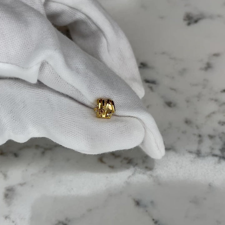 Our favorite, and soon to be your favorite, luxe quality nose ring that can also be worn as an earring!   Sold in a quantity of 1: 18k gold plated, 8mm barbell post, with and abstract detail V-cut, 6mm round, A+++ CZ encased crystal stone with a screw ball back for added security while in the nose or ear. Super unique design that can really only be fully appreciated in person (see video for more detail).